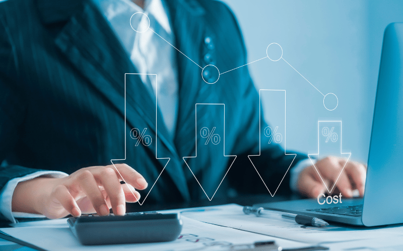 Image of businessman analysing energy procurement cost savings using arrow graphs